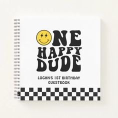 a notebook with the words one happy dude on it