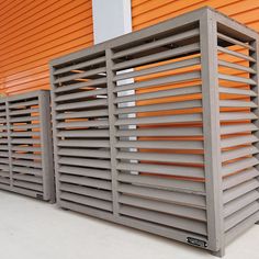 an orange storage unit with metal slats