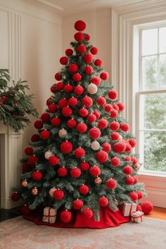 a christmas tree with red and white ornaments