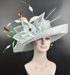 "Buying a hat? Don't forget to send me  your head measurement before placingyour order! IF YOU LIKE THE DESIGN, JUST WANT TO ADD SOME COLORS TO MATCH YOUR DRESS, PLEASE FEEL FREE TO CONTACT ME, I WILL HELP YOU. This beautiful sinamay hat is an elegant wear at any church or derby event. its sinamay material is not too intimidating and attracts the eye. The chic flower adnorment that rests on the wide, side sweep brim is complemented by sinamay accentuations. Material: Sinamay with feathers Crown High Crown Hat For Kentucky Derby Garden Party, High Crown Hat For Kentucky Derby And Garden Parties, Flat Brim Costume Hats For Royal Ascot Garden Party, Whimsical Curved Brim Hat For Royal Ascot, Whimsical Costume Hat With Curved Brim For Royal Ascot, High Crown Hat For Garden Party At Royal Ascot, Royal Ascot Flat Brim Costume Hat For Garden Party, Whimsical Wedding Hat For Royal Ascot, Whimsical Wide Brim Wedding Hat