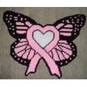 a pink butterfly with a heart on it