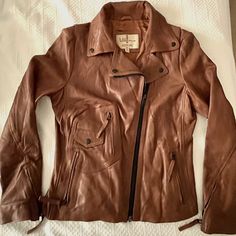 Beautiful Wilson Vintage Usa Brown Women’s Jacket Mint Condition Photos Do Not Do This Jacket Justice As It Is A Really Super Nice Jacket. The Color Is A Brown; But Not Too Far From A Cognac Color A Tad Darker. Size M *Ohh The Feeling A Girly Gets When She Puts On A Leather Jacket And The Perfect Pair Of Jeans And Add Your Favorite Boots Too, Fitted Retro Vintage Brown Leather Jacket, Vintage Brown Leather Jacket With Buttons, Vintage Brown Leather Jacket With Snap Buttons, Vintage Distressed Brown Leather Jacket, Wilsons Leather Jacket, Vintage Brown Single-breasted Leather Jacket, Vintage Usa, Favorite Boots, Cool Jackets