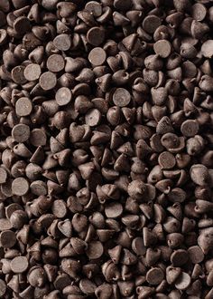 a pile of chocolate chips sitting next to each other