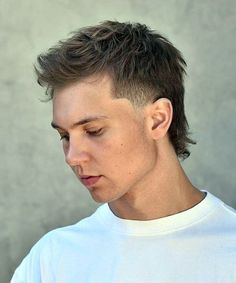 Short Mullet with Temp Fade. This modern baseball player hairstyle is stylish, low-maintenance and incredibly attractive for guys. Classy Mullet, Faded Mohawk Boys, Trendy Mullet, Temp Fade, Popular Boys Haircuts, Modern Mullet Haircut, Baseball Haircuts