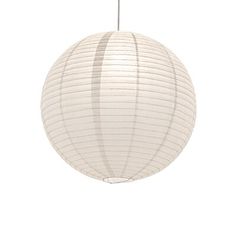 a white paper lantern hanging from the ceiling