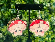 Adorable Mushroom Earrings Product Description:  2in Clear Acrylic earrings, Iron earring hooks (Nickle free, Hypoallergenic Friendly) Light and very cute! May come with clear protective film, please peel off ! Especially if you see any scratches or anything odd. If that is not the case or have any questions/Concerns please contact me! Whimsical Mushroom-shaped Earrings For Gifts, Cute Mushroom Design Dangle Earrings, Cute Dangle Earrings With Mushroom Design, Cute Mushroom-shaped Earrings For Gifts, Cute Handmade Mushroom Earrings, Handmade Cute Mushroom Earrings, Cute Handmade Mushroom-shaped Earrings, Cottage Core Earrings, Acrylic Mushroom