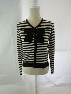 Sleeve Type: Long Neckline: Scoop neck Print: Striped Lining: Unlined Closure: Buttons  Size: Small Color: Black and white Length: 20 inches Armpit to Armpit: 18 inches Fabric: Cotton blend CL: 52-SG PRE-OWNED: Very Good Condition No Significant Flaws or Wear Zara Long-sleeved Cotton Cardigan, Zara Cotton Cardigan For Fall, Goth 60s, 60s Aesthetic, Bow Cardigan, Black And White Jacket, Buy Buy, Wednesday Addams, Striped Cardigan