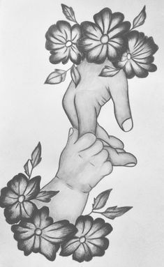 a black and white drawing of two hands holding flowers in each other's hand