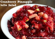 cranberry pineapple jello salad in a white bowl