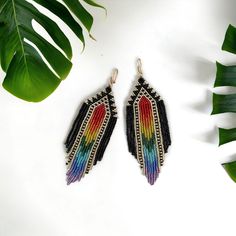 "Rainbow bead fringe earring, Long bead earring, Multicolor statement beaded earrings, Long boho tassel earrings, Rainbow Statement Earrings, Rainbow Boho Earrings, Rainbow Chandelier Earrings, Unique Earrings, Rainbow Chunky Earrings, Rainbow Bohemian Earrings, Rainbow fringe beaded earrings, Colorful beads earrings, Handmade earrings, Gradient dangle earrings, Long earrings,Luxury earring Boho Bright earrings for real fashionistas. Emphasize your exquisite taste and give a special charm to any image. Despite the large size of the earrings, they are not very heavy. These earrings are the perfect finishing touch to your bohemian wardrobe. - Available in the colors shown in the pictures. - Seed beads and stainless steel. How to care for earrings: Avoid direct contact of earrings with cosmet Rainbow Chandelier, Luxury Earring, Bright Earrings, Rainbow Fringe, Earring Long, Fringe Earring, Rainbow Boho, Bead Earring, Bead Fringe