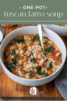 a white bowl filled with italian bean soup on top of a wooden cutting board