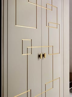 an instagram photo of a door with gold lines on the front and back doors