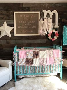 a baby's room decorated in pink and blue