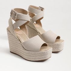 The Vada wedges put you on another level, quite literally. Super tall and so stylish, complemented by an ankle strap for added support. Heel Height: 4.75 inches Platform Height: 1.8 inches Toe: Open Toe Closure: Slip On Material: Fabric and Other or Leather Insole: Synthetic Espadrille Wedge, Summer Sandals, Wedge Sandal, Espadrilles Wedges, Custom Shoes, Sandals Summer, Womens Heels, Sam Edelman, Gold Leaf