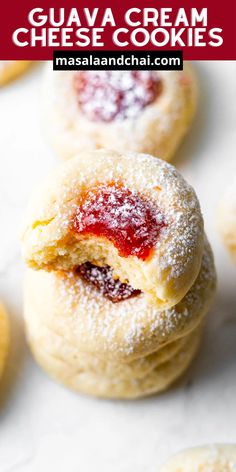 some sugary cookies with jam on them and the words guava cream cheese cookies