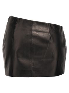 Asymmetric leather skirt with low waist and a side zip closure. Composition: Fitted Leather Bottoms With Side Zipper, Modern Leather Skirt For Night Out, Leather Mini Skirt With Zipper Closure, Modern Leather Mini Skirt, Leather Skirt With Side Zipper For Night Out, Luxury Leather Mini Skirt, Modern Asymmetrical Bottoms For Party, Modern Asymmetrical Skirt For Office, Modern Leather Pencil Skirt