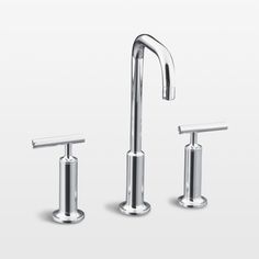 two chrome faucets with handles on each side