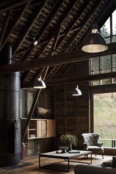 a living room filled with furniture and a fire place