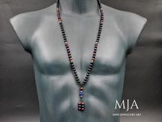 Lapis Lazuli 108 Mala Necklace with Red Agate, Tassel, Black Onyx Beads, and Silver Hematite - Yoga, Buddhist Meditation, Jewelry Gifts The handmade necklace is made of a lapis lazuli and agate stone tassel, 8 mm natural lapis lazuli, red agate, and black onyx beads, 4mm onyx beads, 7*14 lapis lazuli stone, 10 mm hegzonal lapis lazuli stone, 6 mm silver hematite stone. All finished with nylon cord.  - The Mala 36 Inc ( Size = 108 Mala Bead ) - The products are custom-made and done of their kind. Black Agate Beads As A Gift, Handmade Black Mala As Gift, Black Beaded Mala As A Gift, Black Beaded Mala As Gift, Artisan Black Necklace With 108 Beads, Artisan Black Necklaces With 8mm Beads, Artisan Black Necklace With 8mm Beads, Traditional Black Beaded Necklaces With Natural Stones, Artisan Black Gemstone Beads