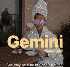 a woman in a sequin outfit holding a cup and saucer with the words gemini on it