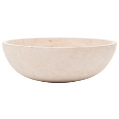 a white bowl sitting on top of a table