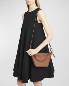 Loewe "Hammock" hobo bag in leather, cotton, and faux leather (polyurethane)    Knot shoulder strap with Anagram cube accent     Zip top closure     Approx. 4.8"H x 3.7"W x 0.5"D    Made in Spain Loewe Hammock, Zip Top, Hobo Bag, Hammock, Neiman Marcus, Knot, Tops Designs, Shoulder Strap, Spain