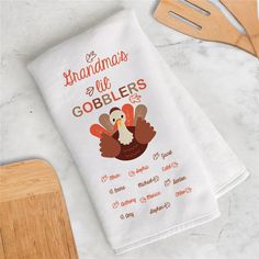 a white towel with an image of a turkey and the words grandmas all gobblers on it