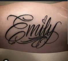 a tattoo with the word family on it