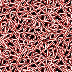 many red and white candy canes are arranged in the shape of an abstract pattern