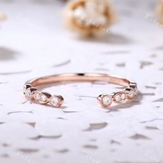 This is a Open milgrain art deco wedding band rose gold plated. The stones are VVS man made Moissanite. Can be stacked or matching. This ring can also be made in genuine solid 10k, 14k, 18k gold or Platinum, and all the rings in my shop can be customized too! If you want to know more details about the ring, just contact with me anytime! If you want to customize the ring, just contact with me anytime! If you want to make a custom jewelry, just contact with me anytime! PROCESS TIME AND SHIPPING It Elegant Rose Gold Bands For Promise Ring, Elegant Rose Gold Promise Ring Bands, Rose Gold Sterling Silver Open Band Ring, Adjustable Rose Gold Rings For Wedding, Rose Gold Open Band Rings For Wedding, Rose Gold Open Band Wedding Rings, Rose Gold Open Band Diamond Ring For Anniversary, Sterling Silver Midi Rings In Rose Gold For Wedding, Rose Gold Open Band Ring With Cubic Zirconia