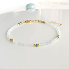 Minimalist, wearable, and delicate 14k gold-filled, blue apatite, and light blue aquamarine bracelet for everyday wearing. Length: from 5,5" (14 cm) to 8" (20 cm) with 1" (2.5 cm) 14k gold-filled extensor chain. Width: 2 mm 14k gold-filled beads, light blue aquamarine beads, and neon blue apatite beads. Material: 14k gold-filled strong lobster clasp. Handmade in Spain. Ideal for a gift to jewelry lovers. All our products are presented in a white organza bag. If you want a different color scheme, Simple Choker Necklace, Bracelet Miyuki, Miyuki Bracelet, Sweet Necklace, March Birthstone Jewelry, Bracelet Minimalist, Gold Armband, Aquamarine Beads, March Birthstone