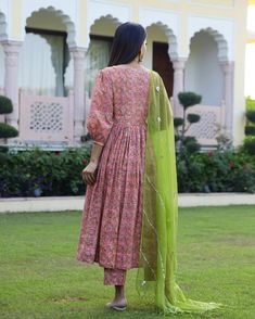 This is a stunning 3-piece set. It comes with cotton hand block print anarkali kurta has 3/4th flared sleeves & calf length.The set also comes with handblock print pants with elasticated waistband and kota doria dupatta with gota detailing. Color-Peach & Green Kurta Fabric-Voil Cotton Bottom Fabric-Voil Cotton Dupatta Fabric-Kota Doria Work-Block Print & Gota Detailing Neck-V Neck Sleeves-3/4th Flared Sleeves Washing Care-Dry Clean Only Cotton Anarkali Set With Floral Print For Festivals, Festive Cotton Anarkali Set With Floral Print, Diwali Cotton Anarkali Set With Floral Print, Cotton Anarkali Set With Floral Print For Diwali, Anarkali Lawn Suit With Kalamkari Print For Festivals, Pink Cotton Anarkali Set For Festivals, Spring Anarkali Kurta With Bandhani Print, Pink Cotton Anarkali Set With Floral Print, Pink Floral Print Cotton Anarkali Set