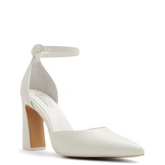 Enhance your luxurious look with these women's Call It Spring Jolie ice (white) heeled dress shoes. Crafted with a polyurethane upper, these 100% Peta-Approved Vegan dressy pumps flaunt a sleek pointed toe and have an adjustable ankle strap with buckle closure for precise fitting. Smooth PU and polyester lining provide support and comfort. The B. E. D Foam insole made of 30% post-consumer waste offers sustainable cushioned comfort and enhanced airflow. A rubber outsole ensures good grip while the self-covered flared heel offers a striking style. | Call It Spring Women's Jolie Pump in White Size 6 Medium Spring Women, Shoes Heels Pumps, Spring Shoes, Wedge Shoes, Slip On Shoes, Pumps Heels, Women's Shoes Sandals, Comfortable Shoes, Shoes Women Heels