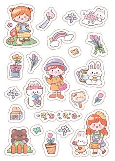 some stickers that are on the side of a white wall with flowers and animals