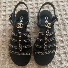 Pristine Chanel Braided Sandals, Luxury Black Sandals With Chain Strap, Chic Black Sandals With Chain, Evening Sandals With Chain Strap And Round Toe, Black Open Toe Sandals With Chain, Black Chain Open Toe Sandals, Luxury Sandals With Chain Strap For Summer, Formal Black Sandals With Chain Strap, Shoes Chanel