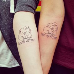 two people with tattoos on their arms that say, until the very end and until the very end