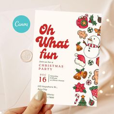 a person holding up a christmas party card