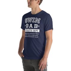 a man wearing a blue swim dad t - shirt