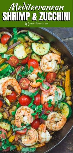 shrimp and zucchini in a skillet with tomatoes, cucumbers, and parsley