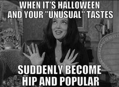 a woman with her hands up in the air and saying, when it's halloween and your unusual tastes suddenly become hip