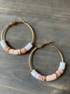 pink and white hoop earrings with gold accents