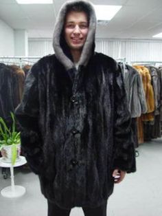 DESCRIPTION: VERY STYLISH BLACK MINK FUR CAR COAT FOR MEN.... BRAND NEWPRODUCED WITH QUALITY AND SELECTED MINK FUR PELTS....FULLY LET OUT....ACCENTUATED WITH FIXED HOOD WITH IRIS BLUE MINK FUR TRIM , COMFORTABLE SLEEVES, FRONT BUTTON CLOSURES..SOFT, SMOOTH AND LIGHTWEIGHT.... WILL DEFINITELY KEEP YOU WARM AND STYLISHGREAT PRICE...DO NOT MISS THIS GREAT OFFER MEASUREMENTS: Size: MADE TO MEASUREMENT LENGTH: 33" SLEEVES: as needed ARGO1846 Oliverfurs 9250 Parc Ave. #204, Montreal, Quebec, H2N 1Z2, Canada www.oliverfurswholesale.com oliver@oliverfurswholesale.com Toll free: 1-866-845-9997 International: 1-514-845-9997 Black Hooded Fur Coat For Fall, Black Fur Coat With Pockets For Fall, Black Long Sleeve Fur Coat With Pockets, Classic Black Long Sleeve Fur Coat, Classic Black Hooded Outerwear, Luxury Black Long Sleeve Fur Coat, Classic Long Sleeve Mink Outerwear, Coat For Men, Blue Iris