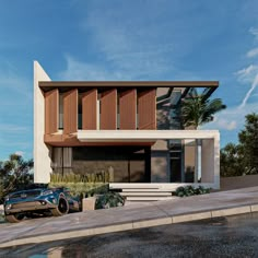 a car is parked in front of a modern house