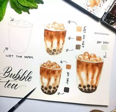 a drawing of bubble tea on top of a white table next to some green leaves