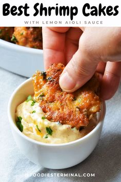 the best shrimp cakes with lemon aioli sauce in a white bowl on a table