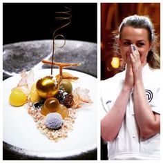 the woman is holding her hands up to her mouth and looking at the food on the plate