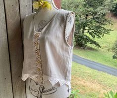 "a linen top pale ecru / mushroom coloured with ivory cotton crochet embellishments  front buttoning  loose fit SIZE ~ XL , xxl bust when fastened is 42\" / 107 cm length is 19\" / 48\" mannequin is size small  gentle wash" Vintage Beige Crochet Top With Crochet Trim, Cottagecore Linen Blouse For Summer, Summer Cottagecore Linen Blouse, Cream Linen Tops With Buttons, Cream Linen Top With Buttons, Cottagecore Linen Tops For Spring, Spring Cottagecore Linen Tops, Bohemian Linen Blouse With Lace Trim, Bohemian Beige Linen Top