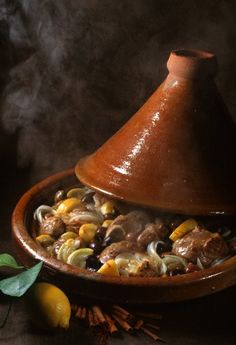 a large pot filled with food on top of a table