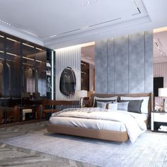 a bedroom with a large bed and closets