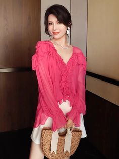 This is perfect for those who are looking for a clothing for a good price. It is fashionable, stylish, and it will look great on anyone who wears it. Do you wanahavit? SIZE S:bust:106cm,sleeve length:62cm,length:68cm M:bust:110cm,sleeve length:63cm,length:69cm Note: 1 inch = 2.54 cm, 1 cm = 0.39 inch Measurement by hands allow 2-3cm errors which is normal Chic Pink V-neck Blouse, Pink V-neck Chiffon Top, Casual Pink Chiffon Top, Casual Pink Chiffon Blouse, Trendy Pink Chiffon Tops, Trendy Chiffon Blouse With Ruffles, Feminine Chiffon V-neck Top, Trendy Pink Blouse With Ruffles, Trendy Chiffon Blouse